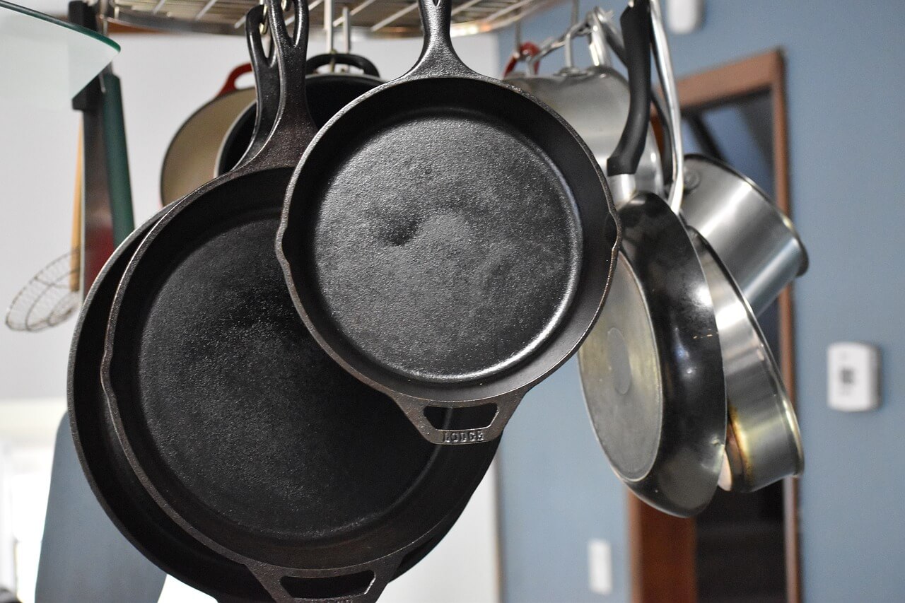 How to clean black residue off cast iron skillet